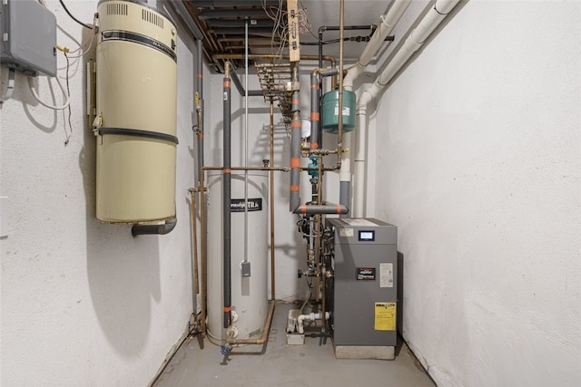 218 Burnt Cedar Dr, North Kingstown, RI 02852 - utility room featuring a central vacuum unit, water heater, and a heating unit