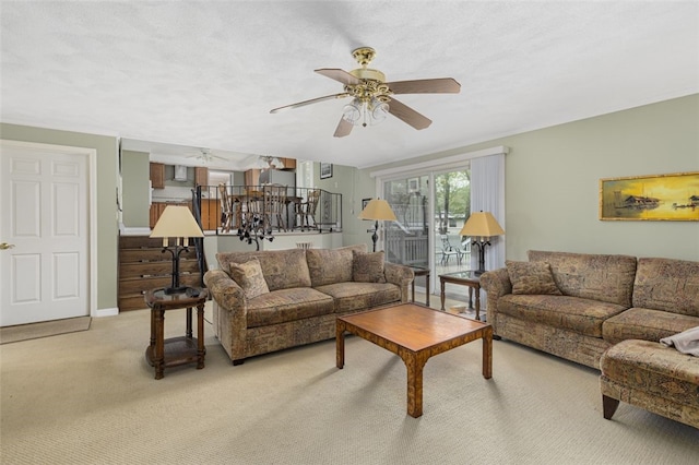 218 Burnt Cedar Dr, North Kingstown, RI 02852 - living room with a ceiling fan and light carpet