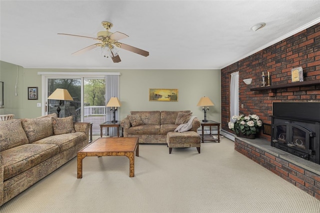 218 Burnt Cedar Dr, North Kingstown, RI 02852 - carpeted living area with ceiling fan, a wood stove, and brick wall
