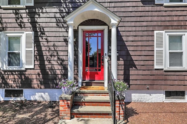 view of exterior entry featuring crawl space