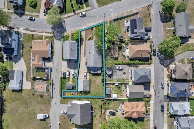 aerial view of residential area with property boundaries highlighted
