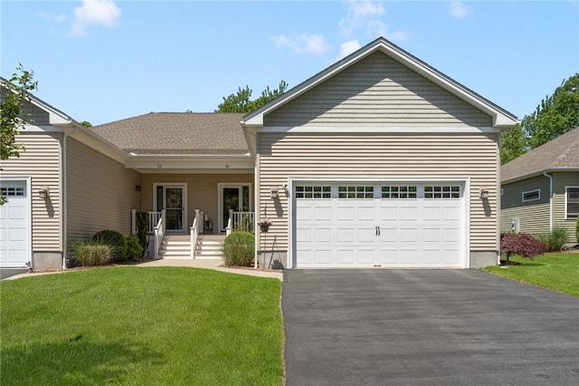 16 Kimberly Ct, North Kingstown, RI 02852 - ranch-style home featuring driveway, a front lawn, and a garage