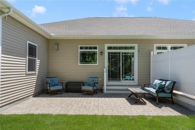 16 Kimberly Ct, North Kingstown, RI 02852 - back of property featuring a patio area, outdoor lounge area, and a shingled roof