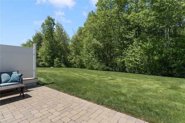 16 Kimberly Ct, North Kingstown, RI 02852 - view of green lawn featuring a patio