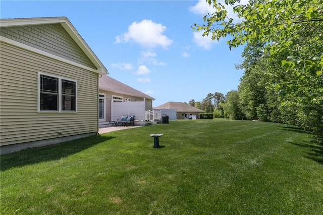 16 Kimberly Ct, North Kingstown, RI 02852 - view of grassy yard with a patio
