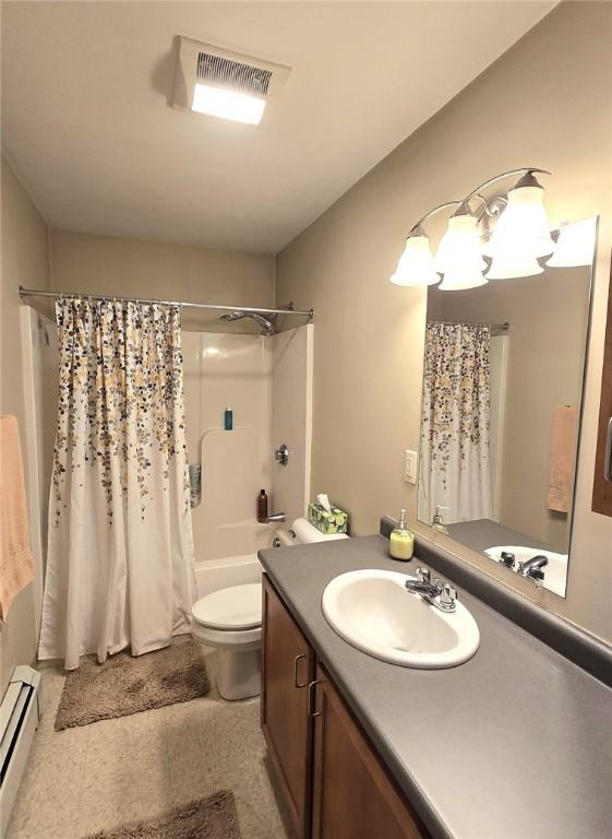 94 Barton St, Pawtucket, RI 02860 - bathroom with a baseboard radiator, vanity, toilet, and shower / tub combo