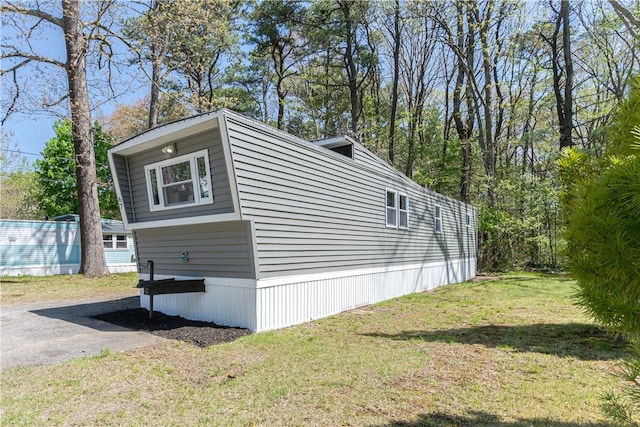 67 Linda Dr, Coventry, RI 02816 - view of property exterior featuring a lawn