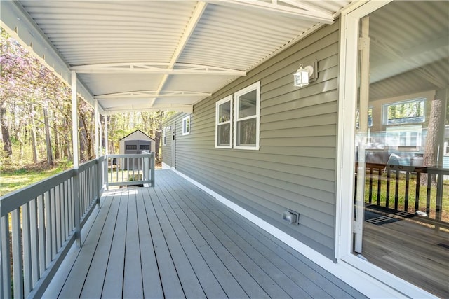 67 Linda Dr, Coventry, RI 02816 - wooden deck featuring an outbuilding