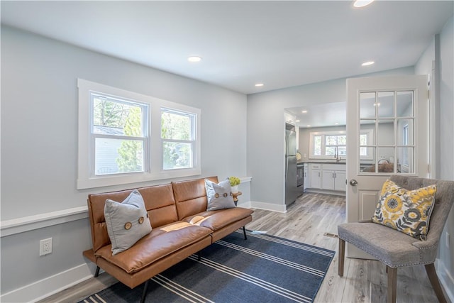 67 Linda Dr, Coventry, RI 02816 - living area featuring recessed lighting, light wood-style floors, and baseboards