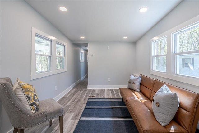 67 Linda Dr, Coventry, RI 02816 - living room with plenty of natural light, recessed lighting, baseboards, and light wood-style flooring