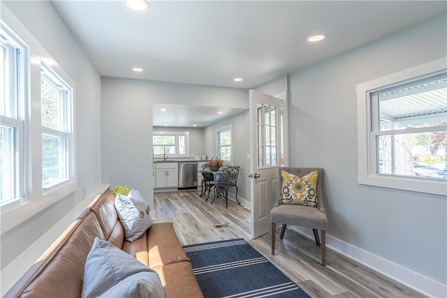 67 Linda Dr, Coventry, RI 02816 - living area with recessed lighting, light wood-style floors, and baseboards