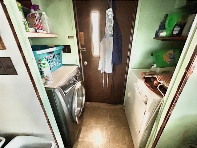 245 Manton St, Pawtucket, RI 02861 - clothes washing area featuring washer and dryer and light tile patterned floors