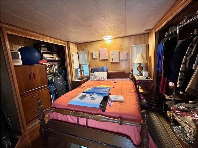 245 Manton St, Pawtucket, RI 02861 - bedroom with wood walls and wood finished floors