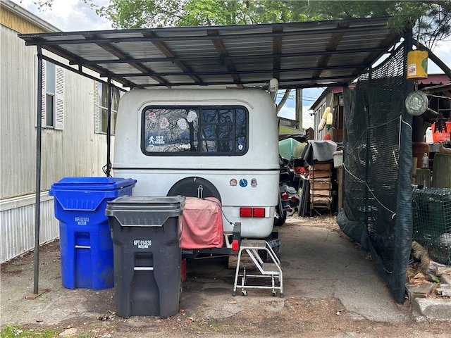 245 Manton St, Pawtucket, RI 02861 - view of vehicle parking featuring a detached carport