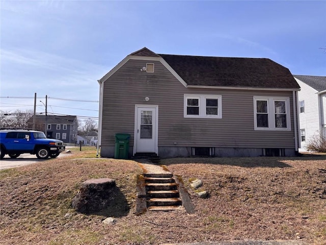 view of front of home with roof with shingles