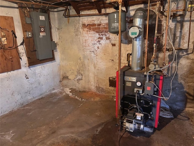 utilities featuring electric panel and a heating unit