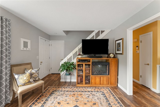 30 Saundra Dr, Westerly, RI 02891 - living area with stairs, wood finished floors, and baseboards