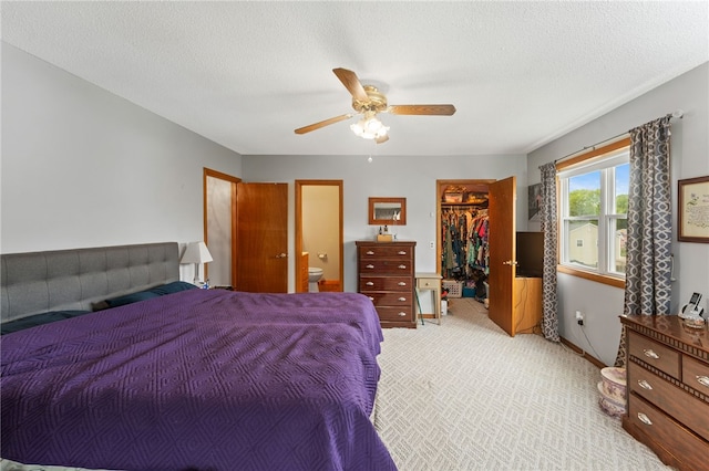 30 Saundra Dr, Westerly, RI 02891 - bedroom featuring light carpet, a spacious closet, a closet, a ceiling fan, and ensuite bathroom