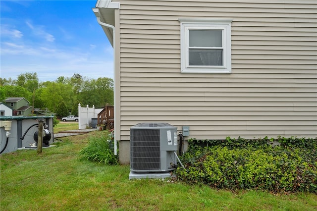 30 Saundra Dr, Westerly, RI 02891 - view of home's exterior featuring central air condition unit and a lawn