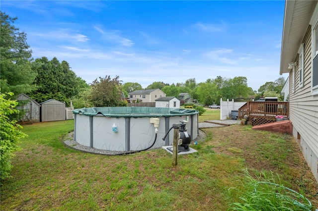 30 Saundra Dr, Westerly, RI 02891 - view of grassy yard featuring a wooden deck and a covered pool