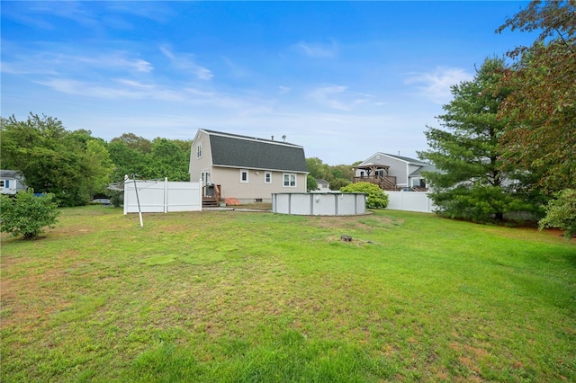 30 Saundra Dr, Westerly, RI 02891 - rear view of property featuring an outdoor pool