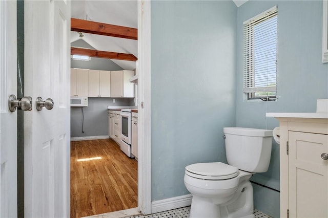 1 Offshore Rd Unit 32, Narragansett, RI 02882 - half bath featuring vanity, baseboards, toilet, and wood finished floors