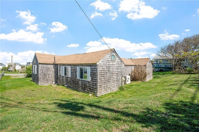1 Offshore Rd Unit 32, Narragansett, RI 02882 - view of home's exterior featuring a lawn