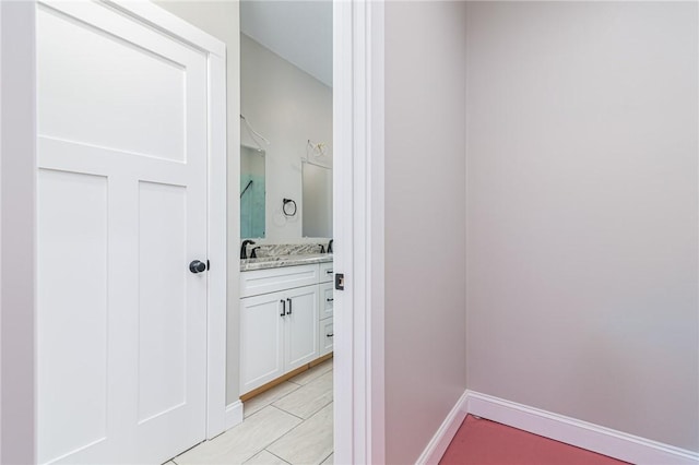 390 Lapham Farm Rd, Burrillville, RI 02859 - bathroom with vanity, tile patterned floors, and baseboards