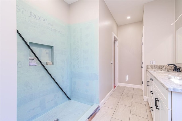 390 Lapham Farm Rd, Burrillville, RI 02859 - full bathroom with baseboards, a walk in shower, double vanity, marble look tile flooring, and recessed lighting