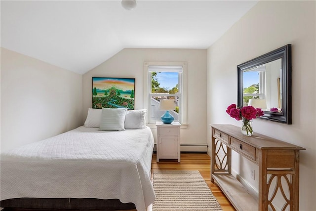 29 Webster St, Newport, RI 02840 - bedroom with a baseboard heating unit, light wood-style flooring, and lofted ceiling