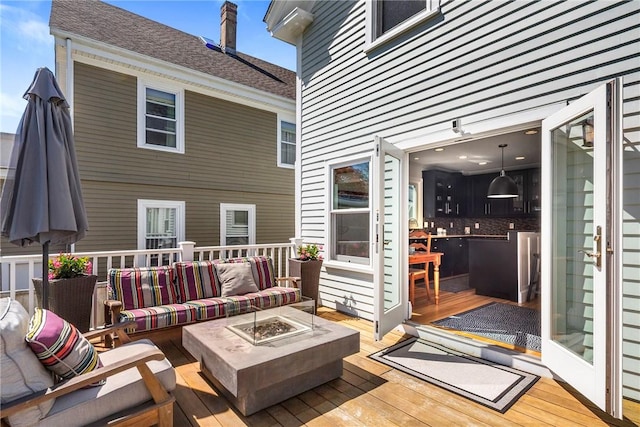 29 Webster St, Newport, RI 02840 - wooden deck featuring an outdoor living space with a fire pit