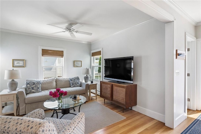 29 Webster St, Newport, RI 02840 - living room with ceiling fan, light wood-style flooring, ornamental molding, baseboards, and baseboard heating