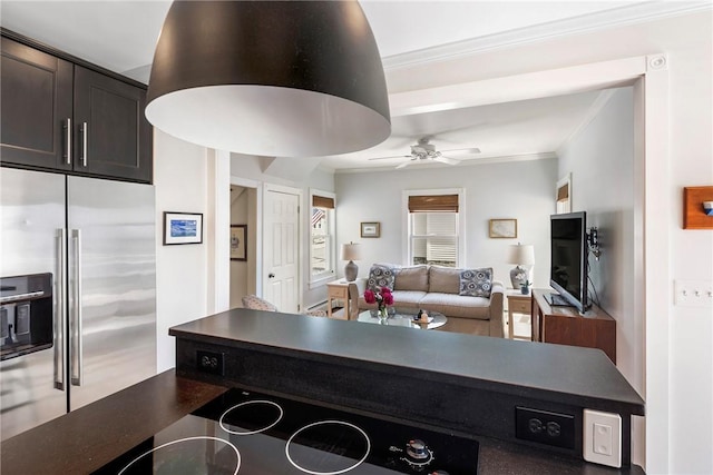 29 Webster St, Newport, RI 02840 - kitchen with high quality fridge, ornamental molding, dark countertops, a ceiling fan, and open floor plan