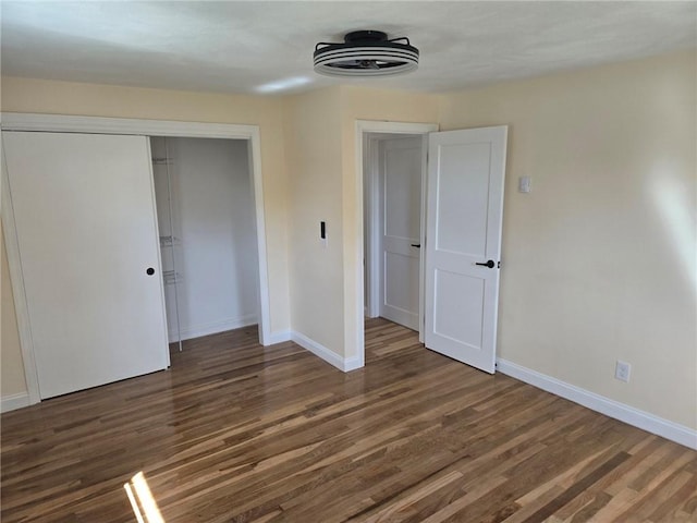 8 Centennial St, Coventry, RI 02816 - unfurnished bedroom featuring wood finished floors, baseboards, and a closet