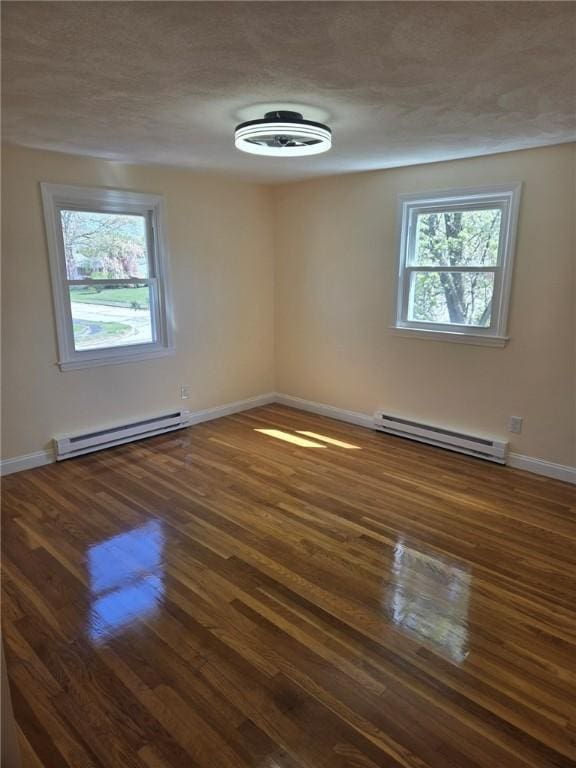 8 Centennial St, Coventry, RI 02816 - empty room featuring a baseboard radiator, healthy amount of natural light, and baseboards