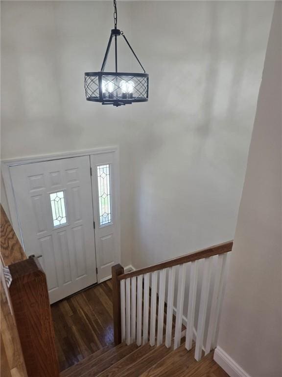8 Centennial St, Coventry, RI 02816 - entrance foyer featuring wood finished floors, a chandelier, and baseboards