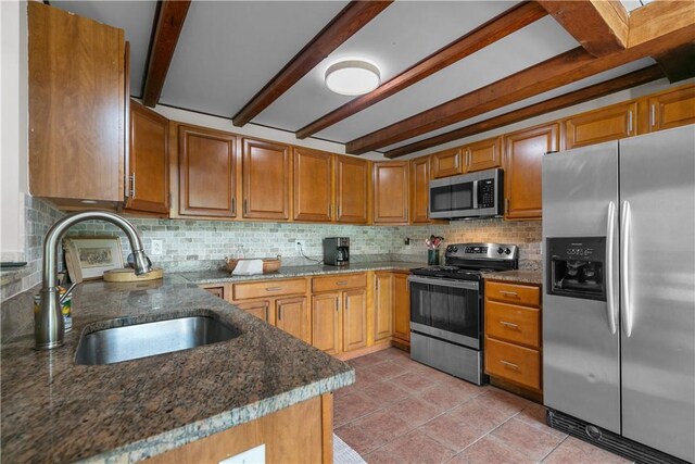 445 Plain Rd, West Greenwich, RI 02817 - kitchen featuring stainless steel appliances, a sink, decorative backsplash, beam ceiling, and brown cabinetry
