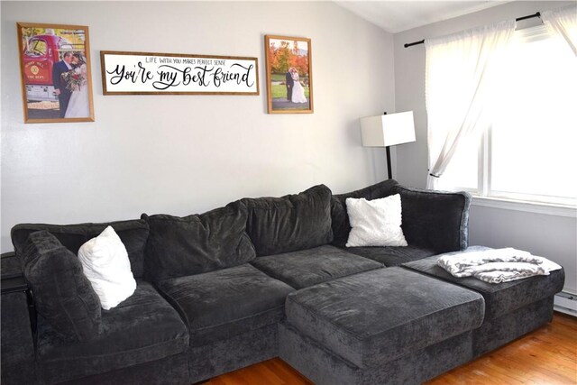 1 Watson Dr, Richmond, RI 02832 - living room featuring wood finished floors, plenty of natural light, and vaulted ceiling