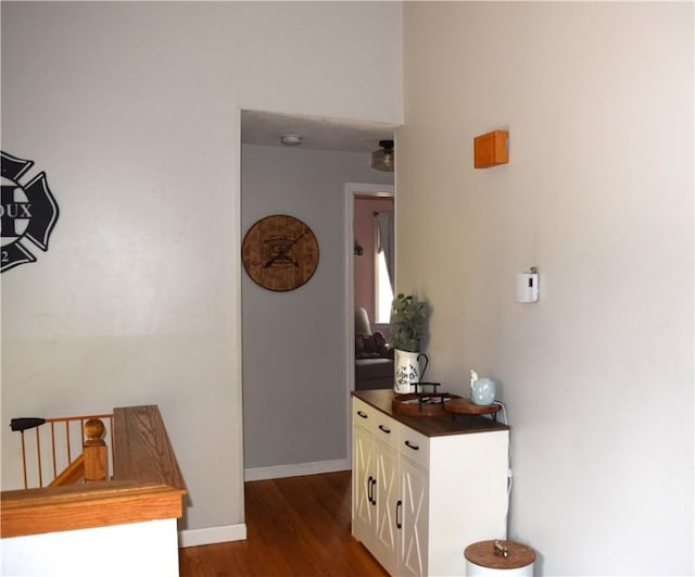 1 Watson Dr, Richmond, RI 02832 - hallway featuring dark wood-type flooring and baseboards