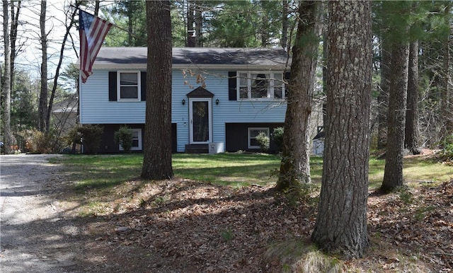 1 Watson Dr, Richmond, RI 02832 - bi-level home featuring a front lawn and a chimney