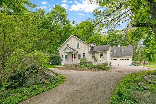 8001 Post Rd, North Kingstown, RI 02852 - traditional home featuring driveway and a garage