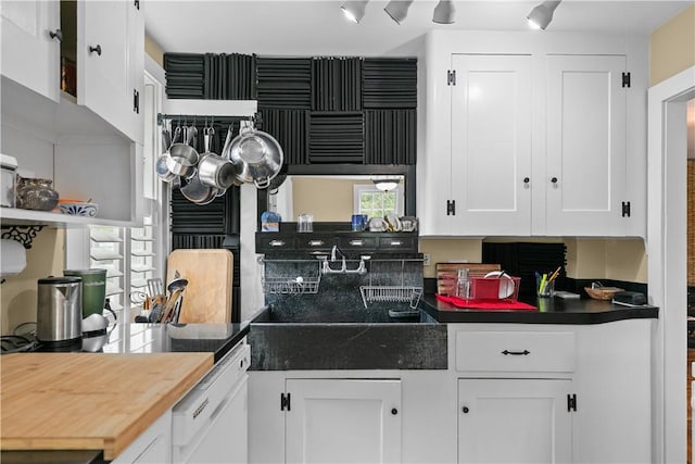 8001 Post Rd, North Kingstown, RI 02852 - kitchen with white cabinetry and dishwasher