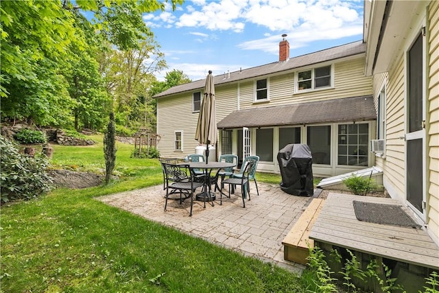 8001 Post Rd, North Kingstown, RI 02852 - rear view of house with a patio, a yard, a chimney, and cooling unit