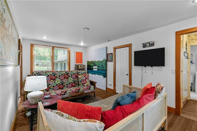 8001 Post Rd, North Kingstown, RI 02852 - living room with wood finished floors, recessed lighting, and baseboards