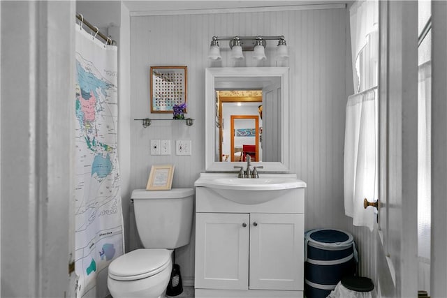 8001 Post Rd, North Kingstown, RI 02852 - full bathroom featuring toilet, vanity, and a shower with shower curtain