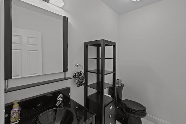 115 Read St, Attleboro, MA 02703 - half bath with toilet, baseboards, and vanity