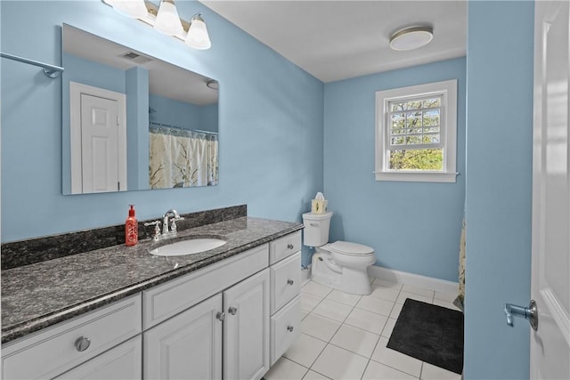 115 Read St, Attleboro, MA 02703 - full bath with tile patterned floors, toilet, vanity, and baseboards