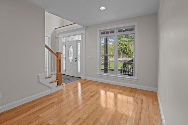 115 Read St, Attleboro, MA 02703 - entryway featuring baseboards, stairs, and wood finished floors