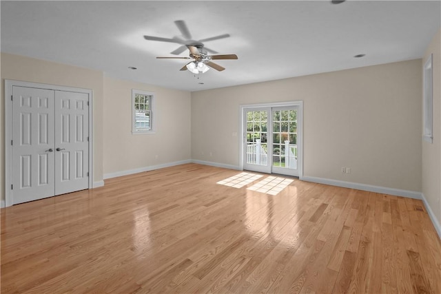 115 Read St, Attleboro, MA 02703 - unfurnished bedroom with access to exterior, light wood-style floors, baseboards, and a ceiling fan