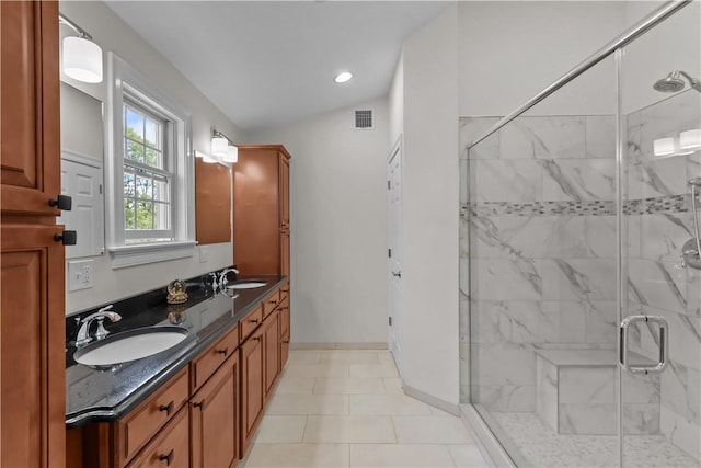 115 Read St, Attleboro, MA 02703 - full bath with a stall shower, double vanity, baseboards, tile patterned floors, and recessed lighting